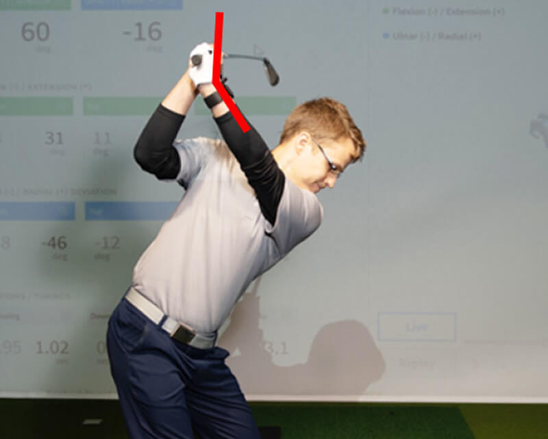 cupped lead wrist at the top of the swing