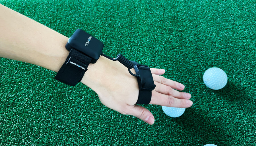 female golfer hand with HackMotion wrist sensor