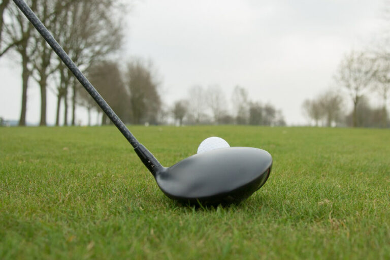 golf driver ready for shot close-up