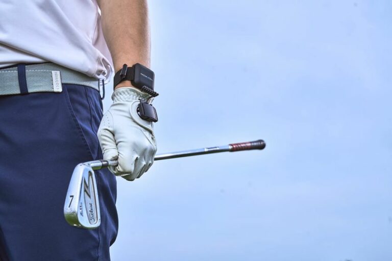 golf player wearing hackmotion wrist sensor closeup