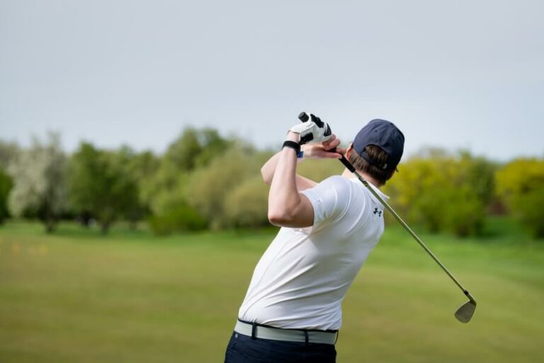 golfer finished the shot with iron