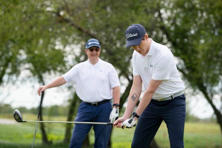 golfer ready to hit with driver