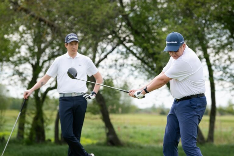 senior golfer hitting with driver